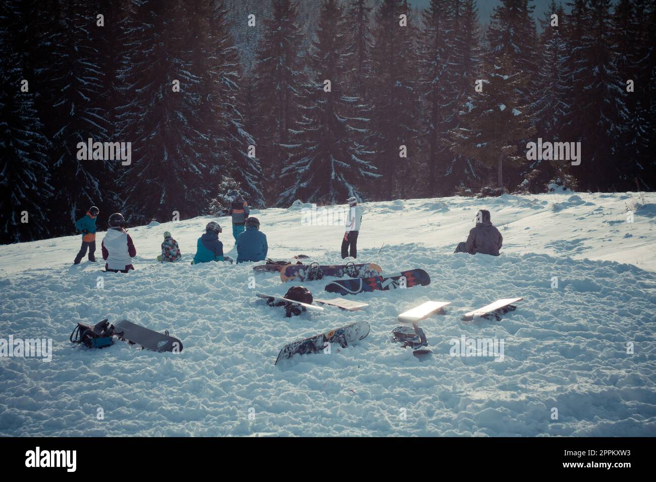 Snowboarders team at resort landscape photo Stock Photo
