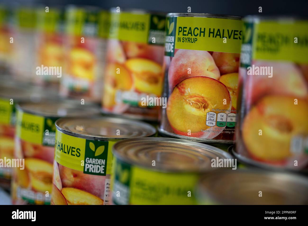 Tinned peaches which is surplus food produce available at The Pantry at