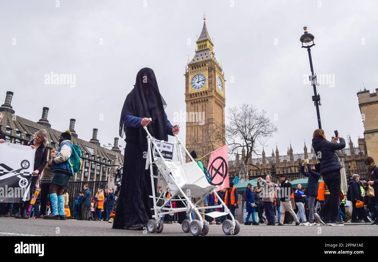 London, England, UK. 24th Apr, 2023. An activist pushes a pram in Parliament Square as Extinction Rebellion protesters march through Westminster on the fourth and final day of protests calling for an end to fossil fuels. (Credit Image: © Vuk Valcic/ZUMA Press Wire) EDITORIAL USAGE ONLY! Not for Commercial USAGE! Credit: ZUMA Press, Inc./Alamy Live News Stock Photo