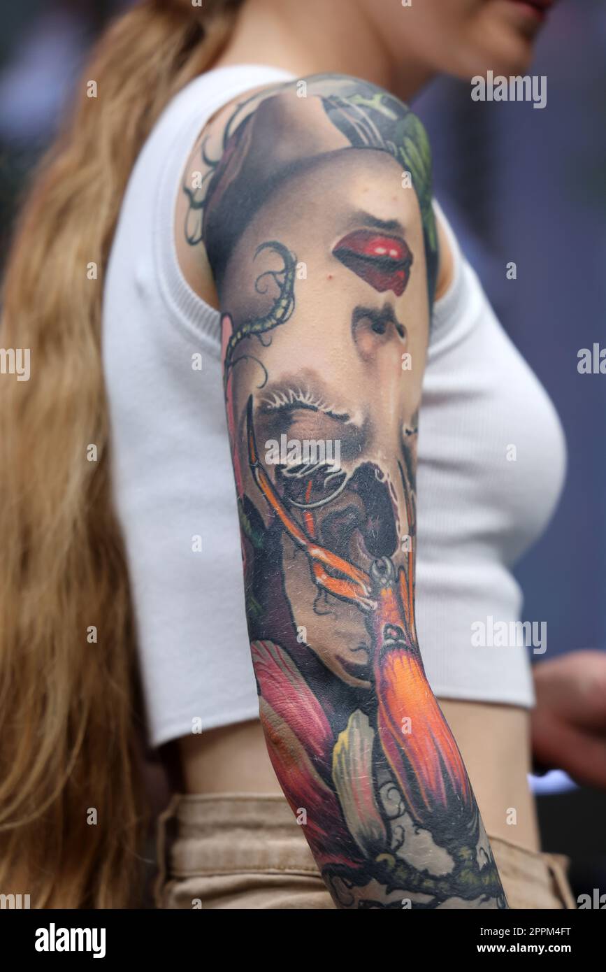 Unidentified participant during the contest for the best tattoo at the 15th Tattoofest Convention in Cracow. One of the most prestigious tattoo festivals. Stock Photo