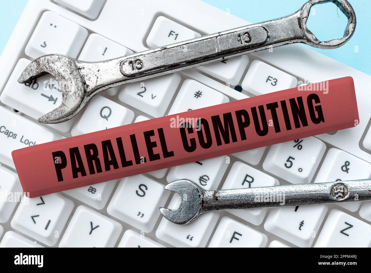 Handwriting text Parallel Computing. Conceptual photo simultaneous calculation by means of software and hardware Stock Photo