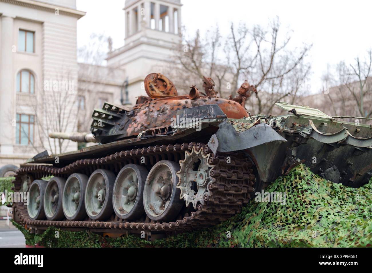 The tank wreck of a Russian T72B now stands as a memorial against war in front of Russian embassy in Berlin.  This tank was destroyed on 31.3.2022 during the Battle of Kyiv on the outskirts of the village Dmytrivka, next to Bucha, by soldiers of Ukraine, Stock Photo