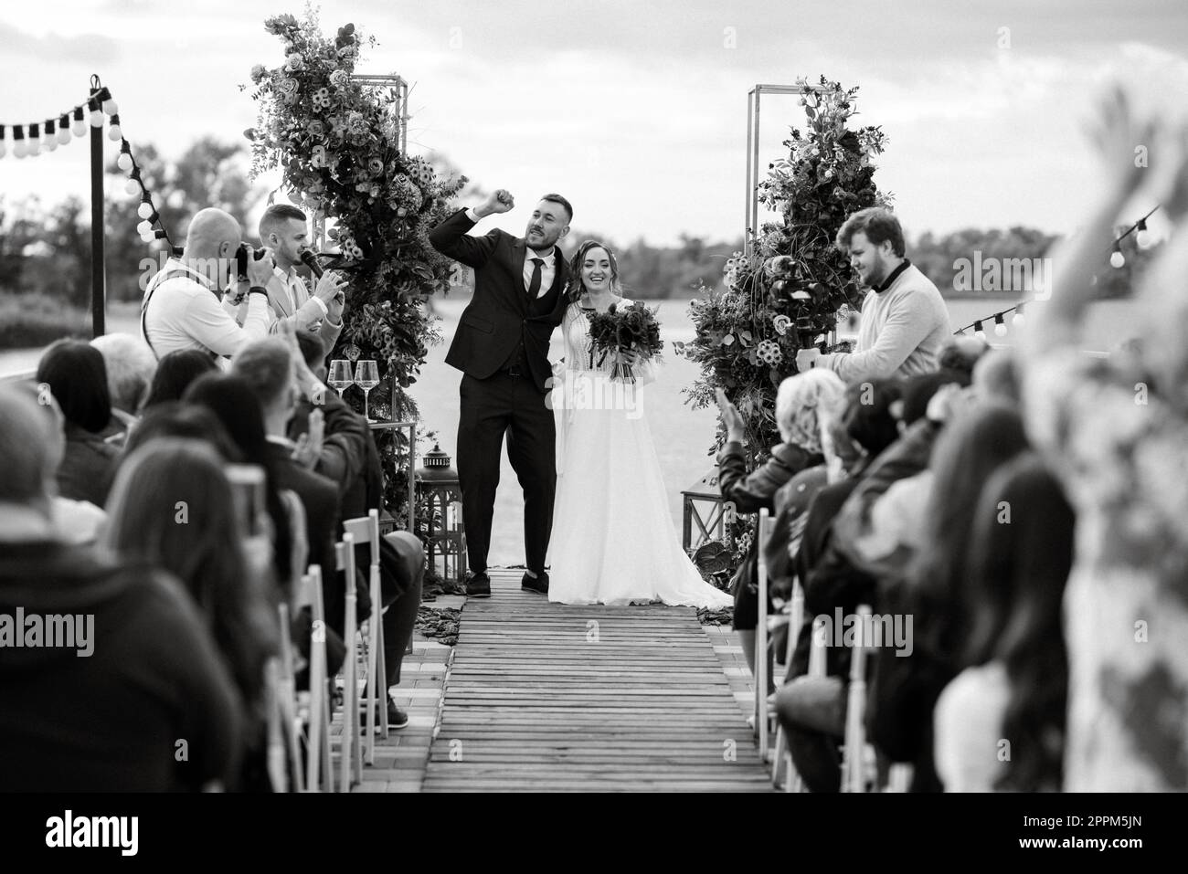 wedding ceremony of the newlyweds on the pier Stock Photo Alamy