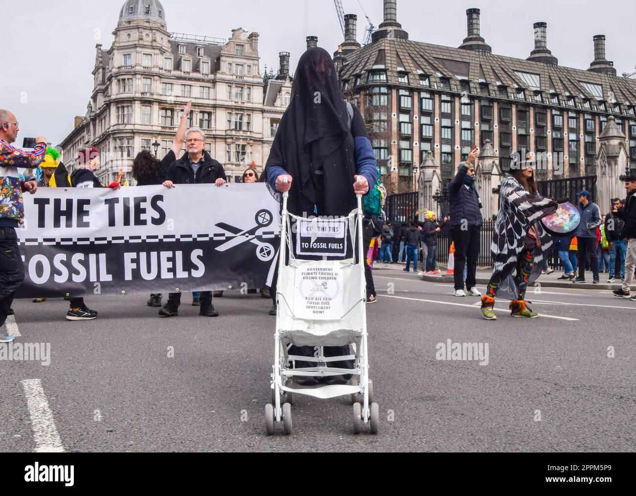 London, England, UK. 24th Apr, 2023. An activist pushes a pram in Parliament Square as Extinction Rebellion protesters march through Westminster on the fourth and final day of protests calling for an end to fossil fuels. (Credit Image: © Vuk Valcic/ZUMA Press Wire) EDITORIAL USAGE ONLY! Not for Commercial USAGE! Credit: ZUMA Press, Inc./Alamy Live News Stock Photo