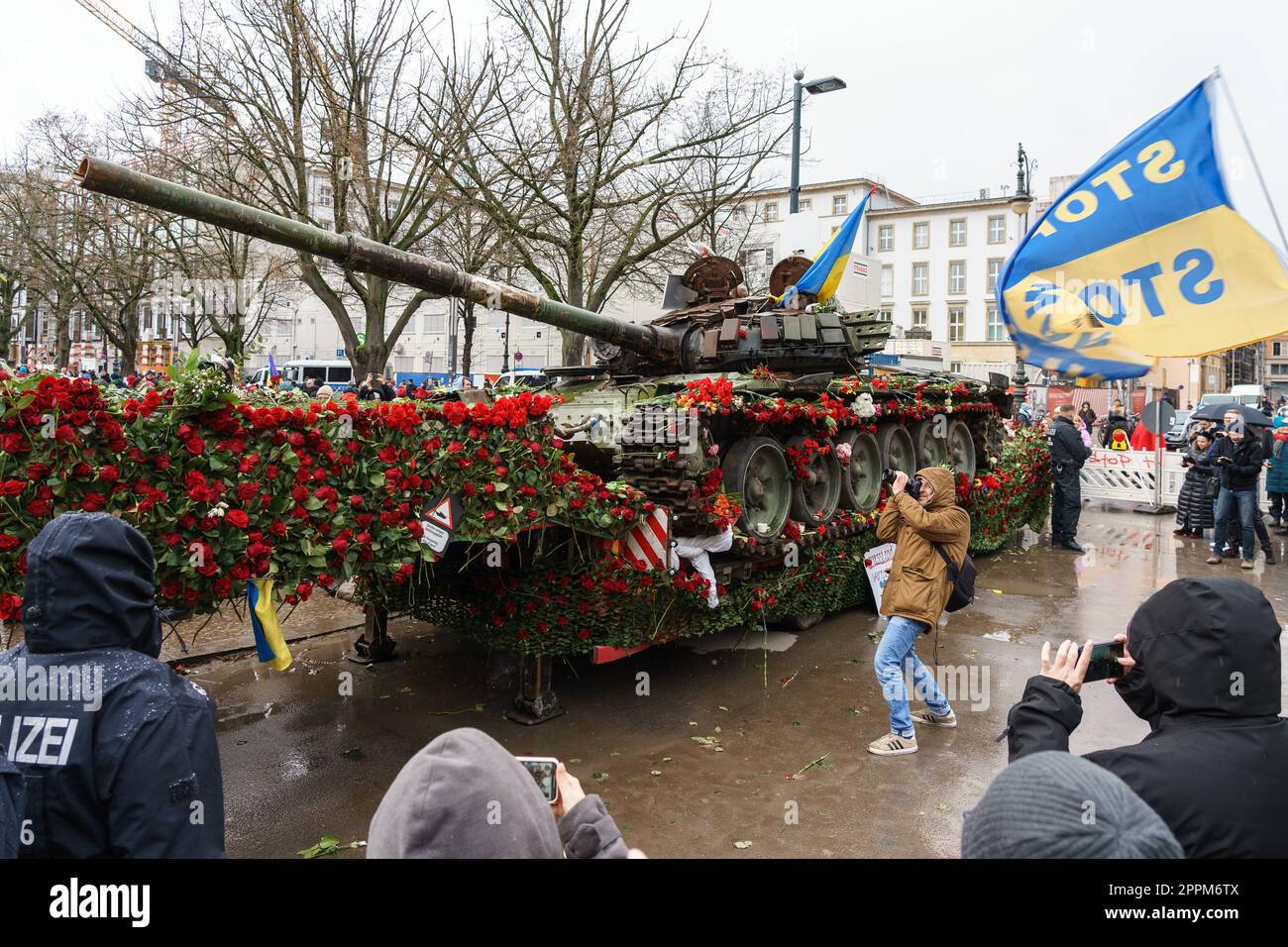 BERLIN - FEBRUARY 25, 2023: Destroyed Russian T-72 tank in front of the Russian embassy on Unter der Linden. Stock Photo