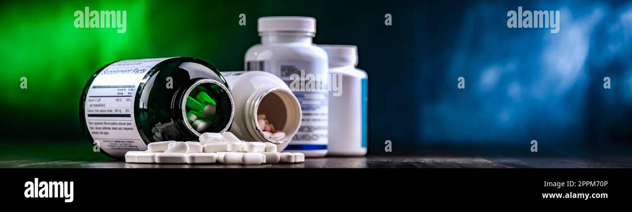 Composition with dietary supplement containers. Drug pills Stock Photo