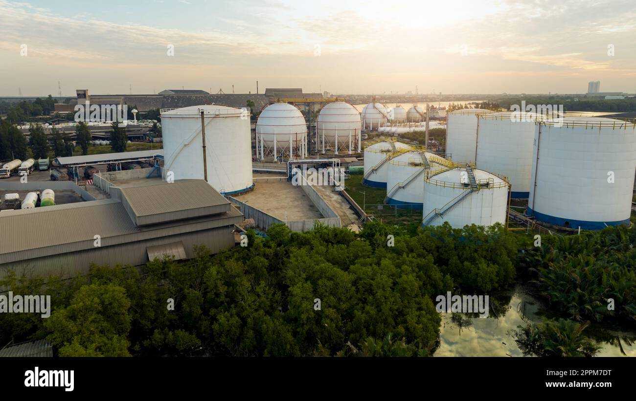 Aerial view of industrial gas storage tank in factory. LNG or liquefied natural gas storage tank. Global energy crisis. Energy price crisis. Natural gas storage industry. Above-ground gas storage tank Stock Photo