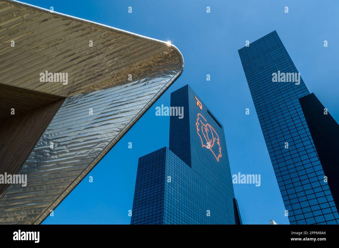 ROTTERDAM, THE NETHERLANDS - AUGUST 23, 2013: View of the Delftse Poort (Delft Gate Building), a twin-tower skyscraper complex next to the Rotterdam Centraal railway station, built between 1988 and 1991. It is also known as Nationale-Nederlanden building Stock Photo