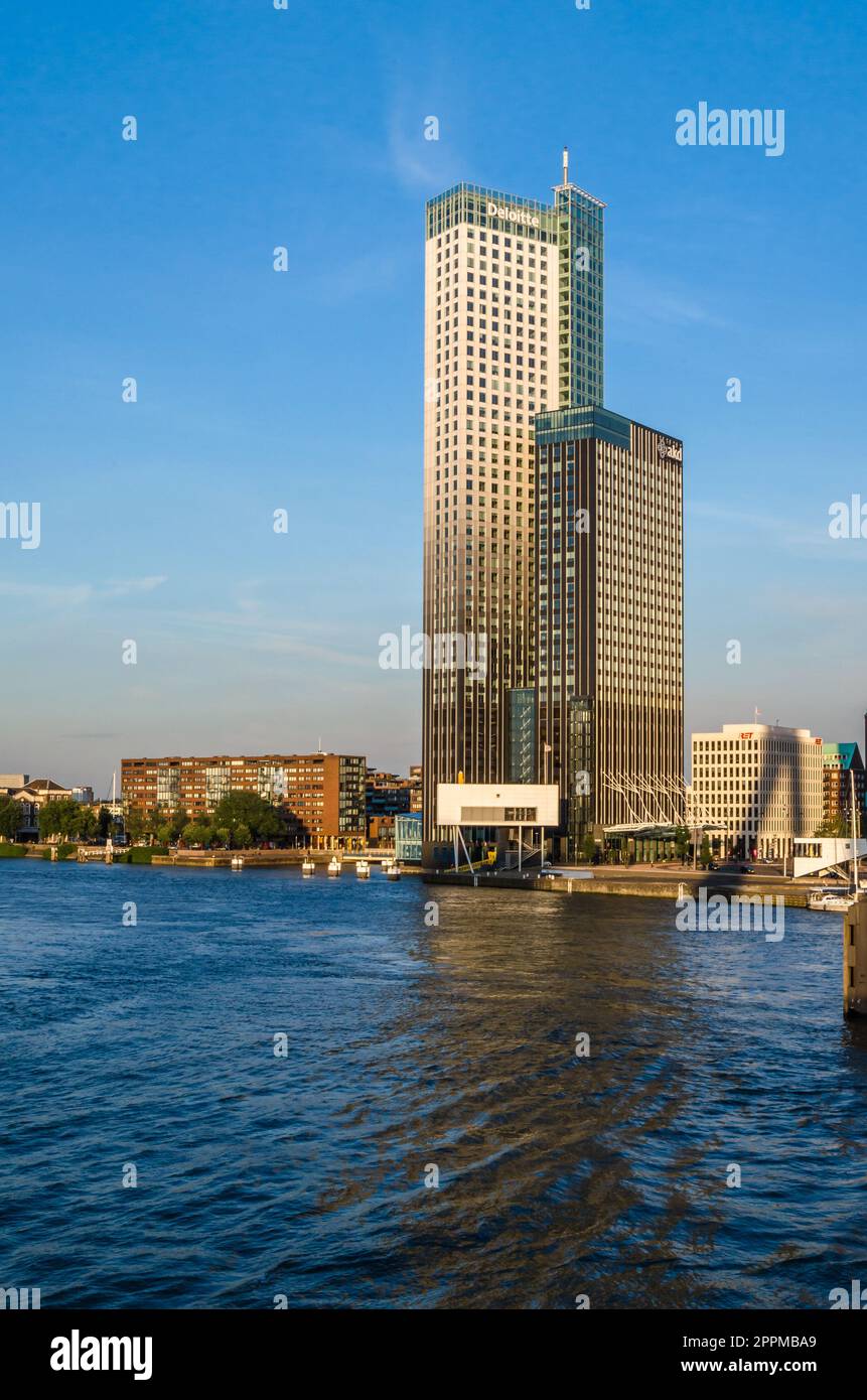 ROTTERDAM, THE NETHERLANDS - AUGUST 26, 2013: View of Maastoren in Rotterdam, the second tallest building in the Netherlands, built between 2006 and 2009, serves as the headquarters of the Dutch branch of Deloitte, and is used by the company AKD Stock Photo