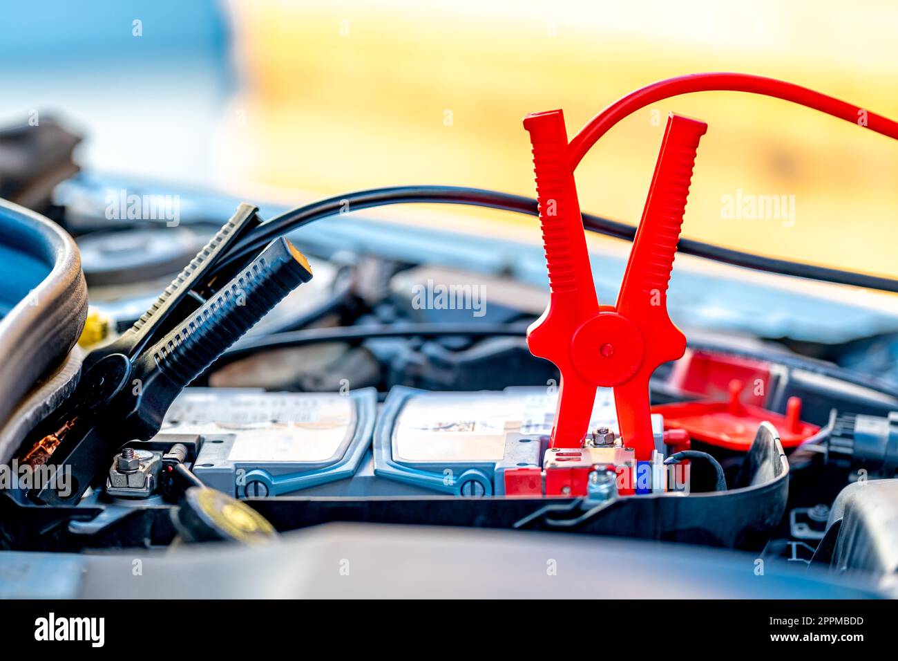 starting the car using the starter cables Stock Photo Alamy