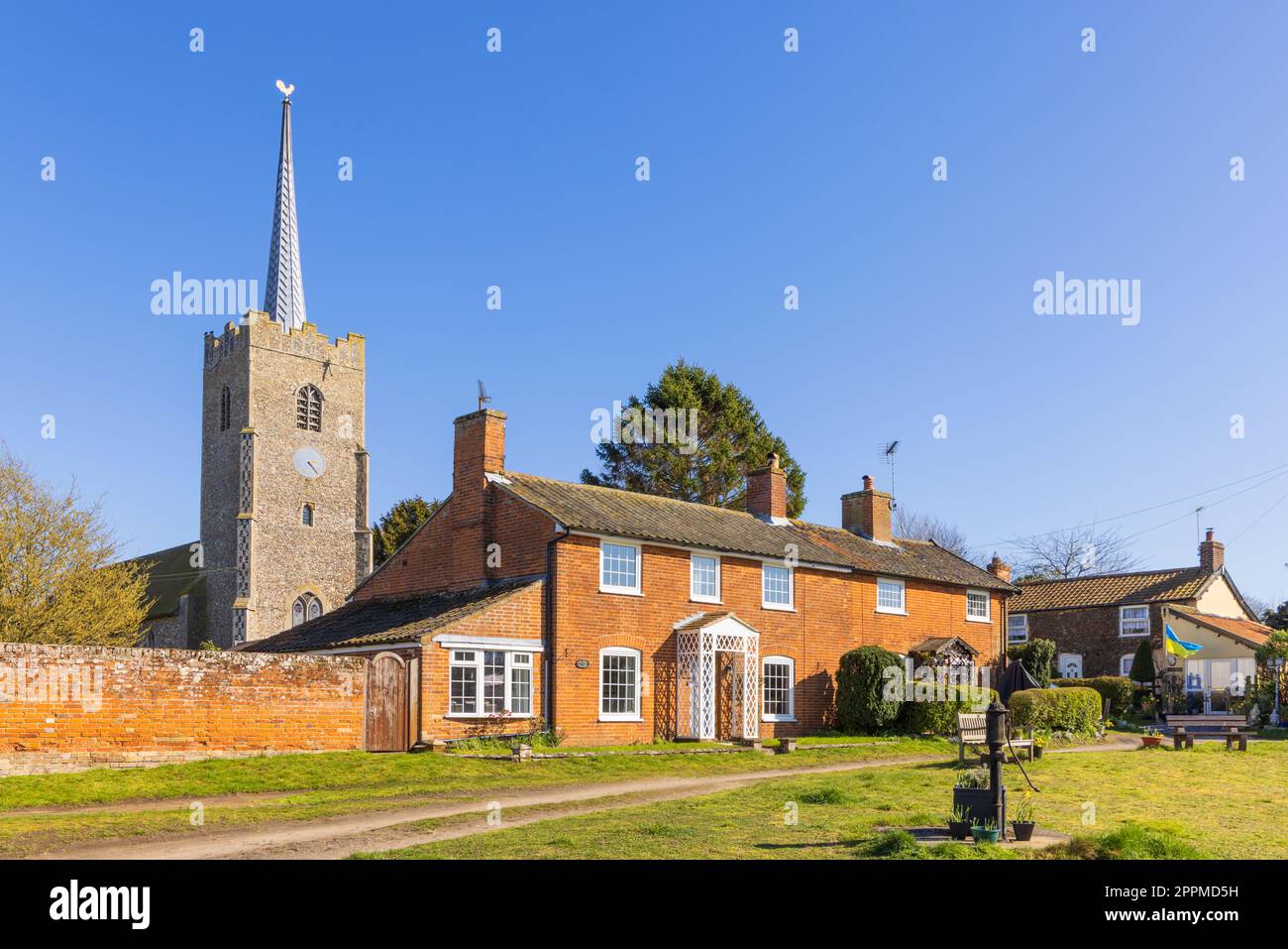 Attractive old cottages and church in the village of Middleton, Suffolk