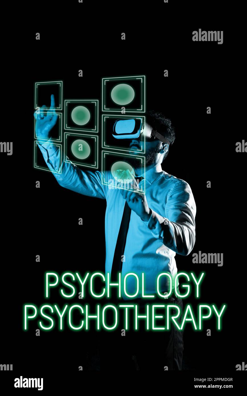 Hand writing sign Psychology Psychotherapy. Word Written on use of a psychological method to treat mental illness Stock Photo
