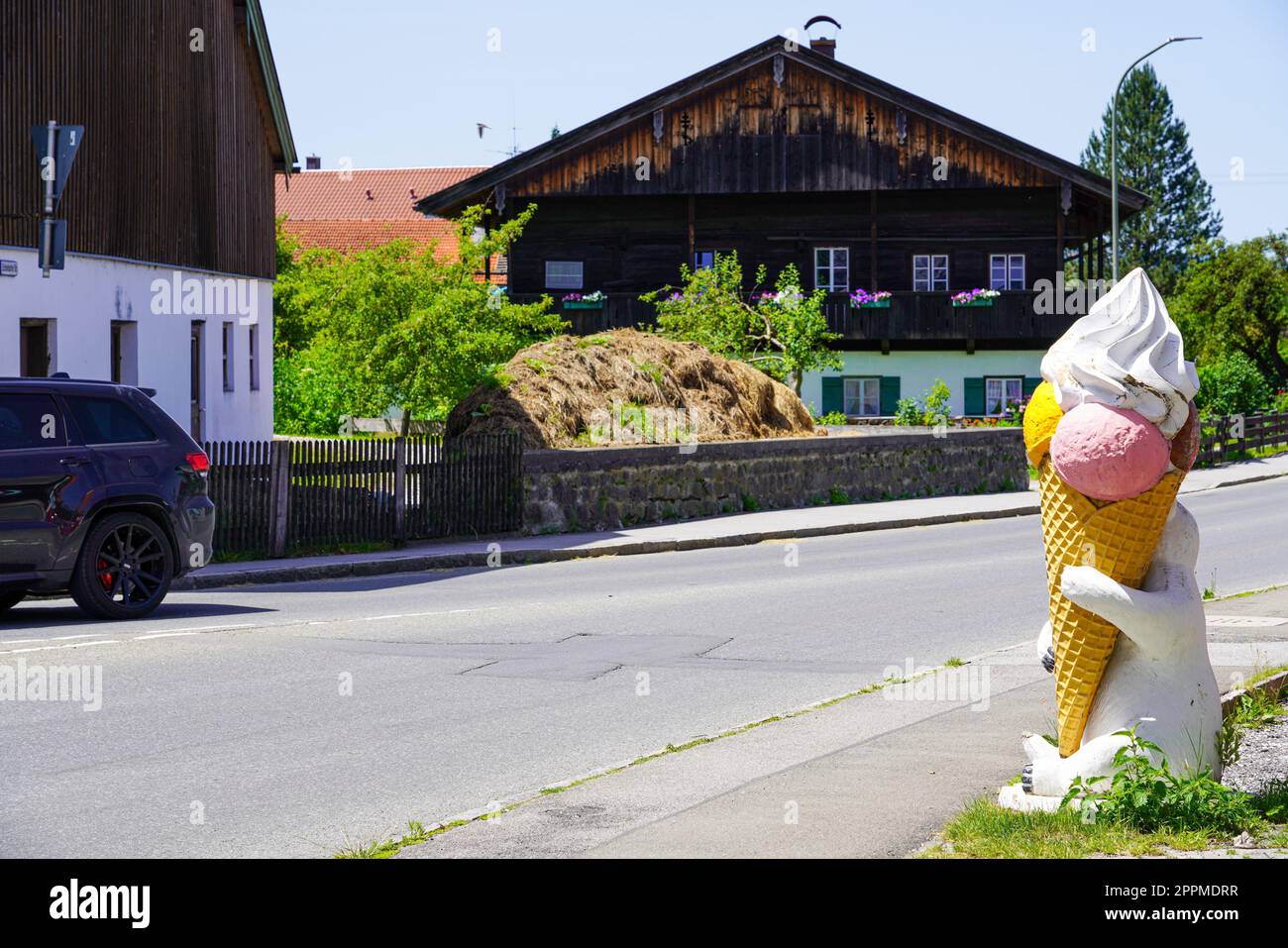 Ice cream cone sculpture at a roadside ice cream parlor in Kochel
