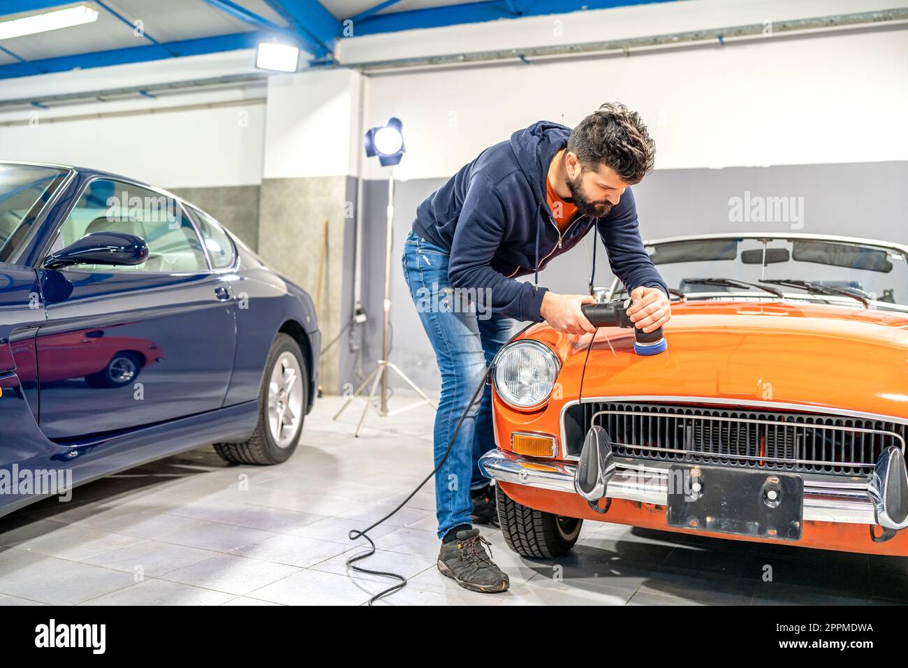 detailing of car body, polishing with using a mechanical sander, care