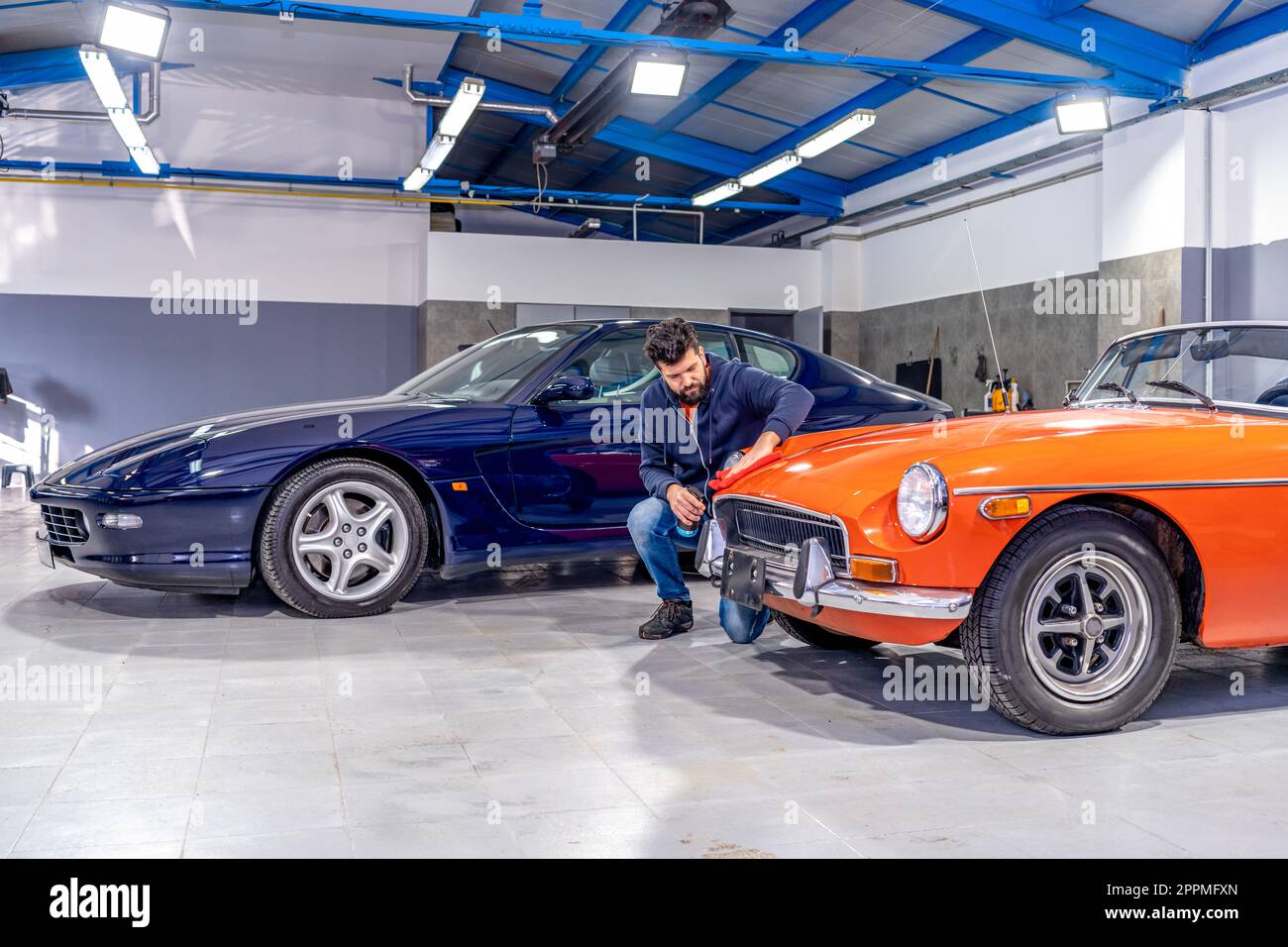 service and maintenance of luxury cars in the garage Stock Photo