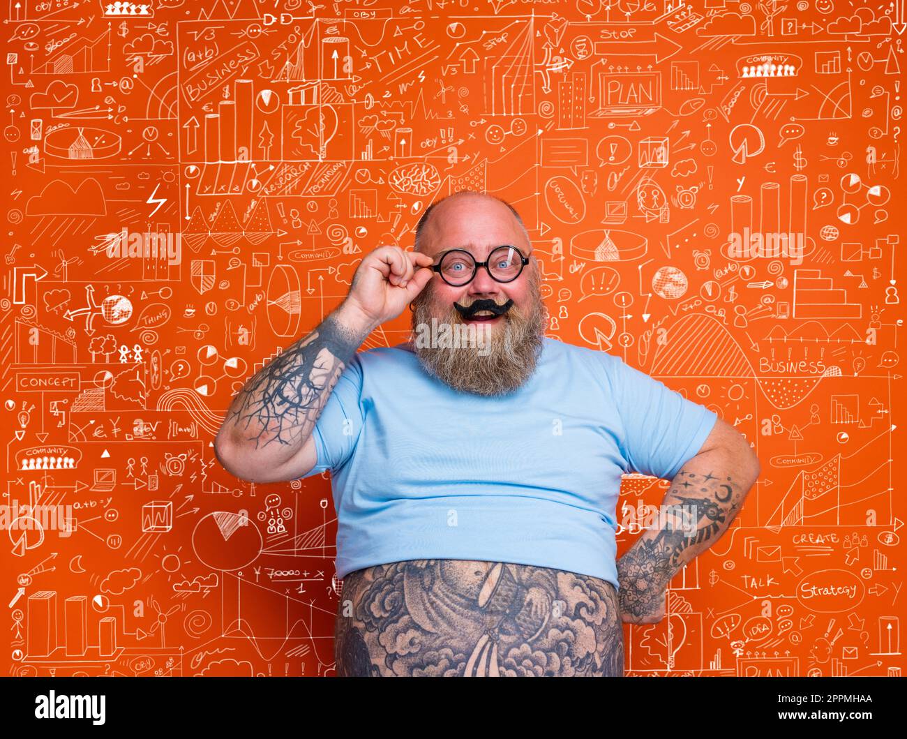 Happy fat man acts like a nerd person Stock Photo
