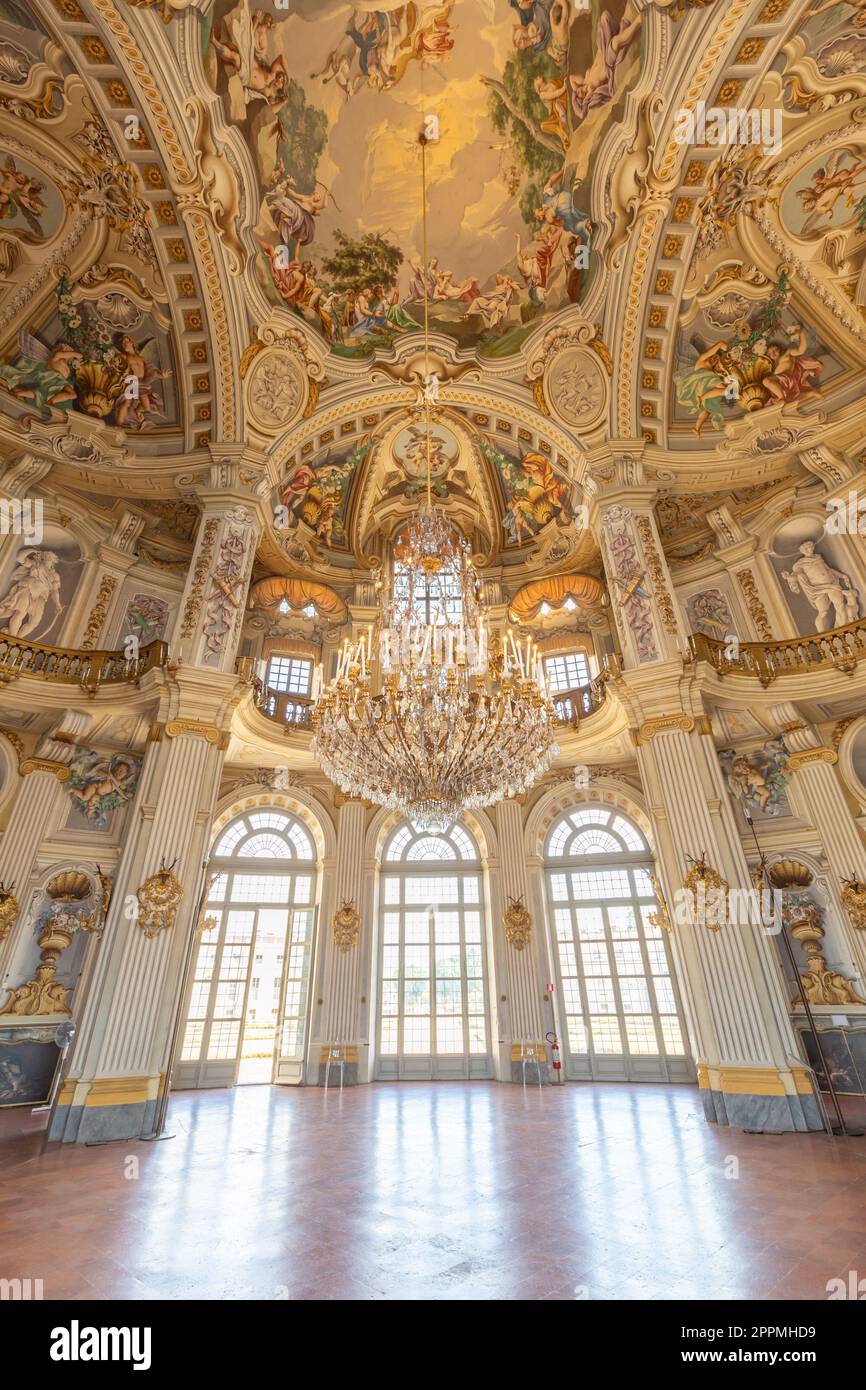 Italy, Stupinigi - January 2023: luxury interior of Royal Palace with baroque design and window Stock Photo