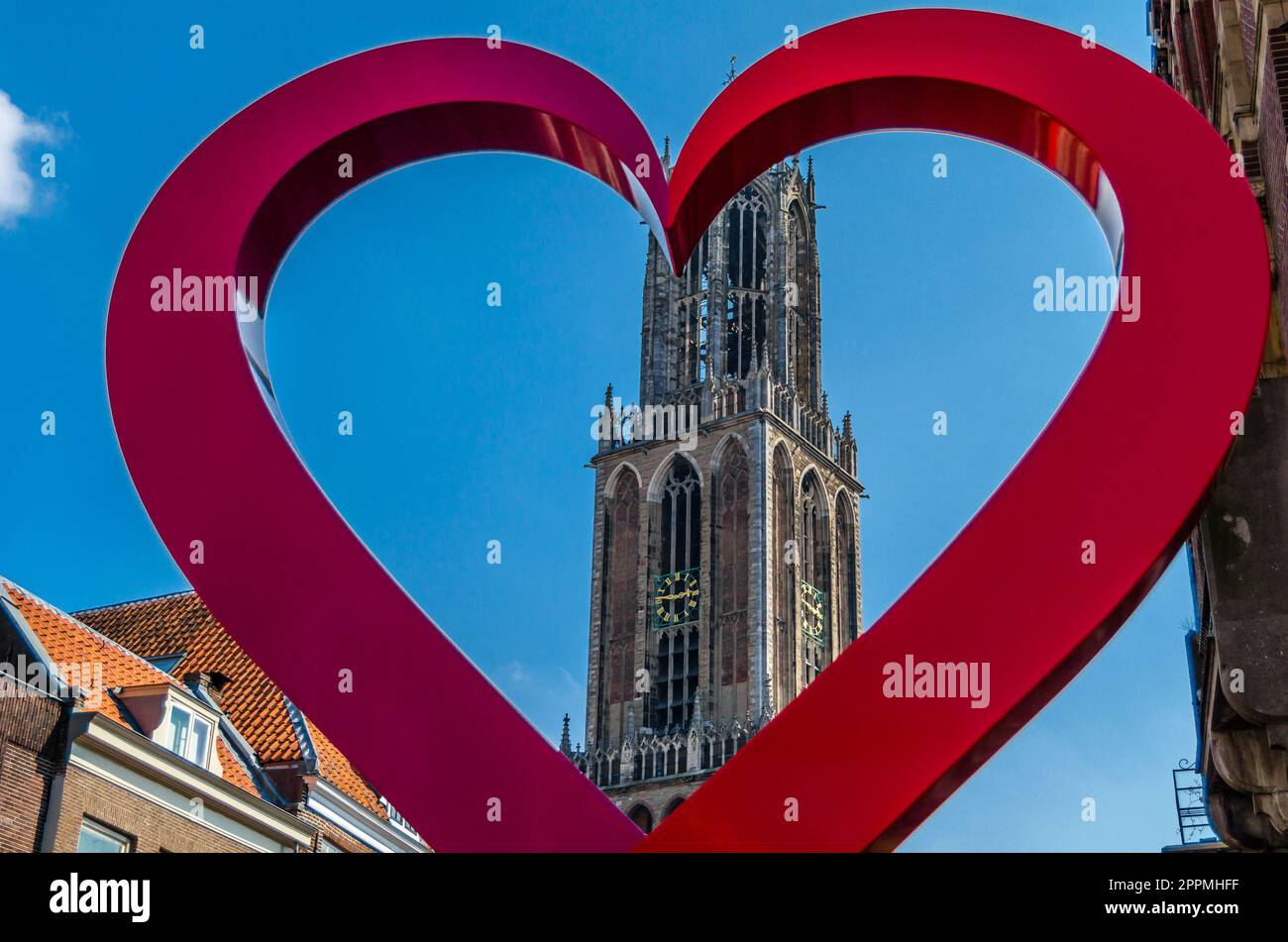 UTRECHT, THE NETHERLANDS - AUGUST 23, 2013: Sculpture 'The Art of Making Peace', consists of two swords forming a heart, placed in Utrecht in 2013 to commemorate 300 years from the signing of the Treaty of Utrecht (1713) Stock Photo