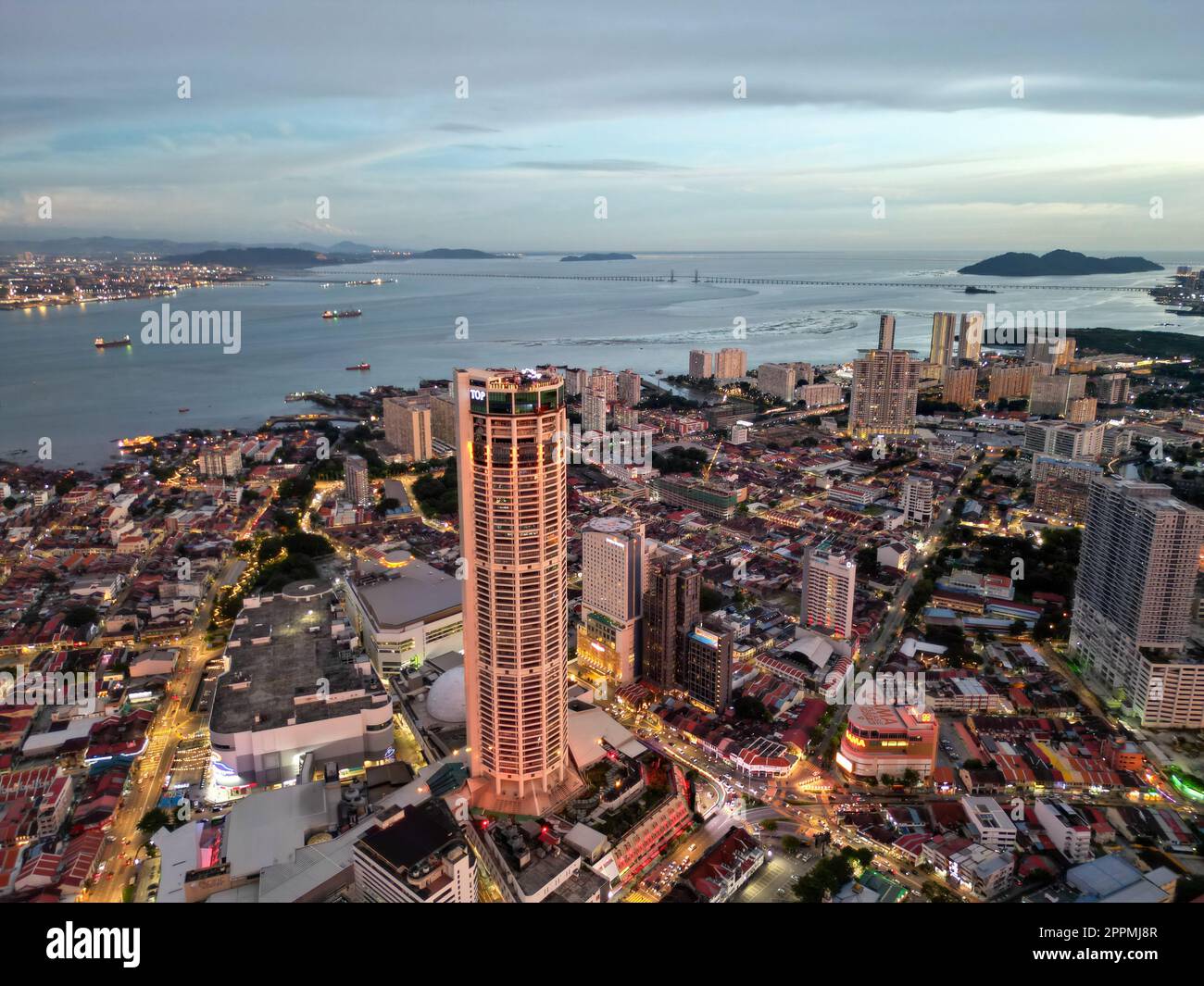 Aerial view illuminated Komtar building in blue hour Stock Photo