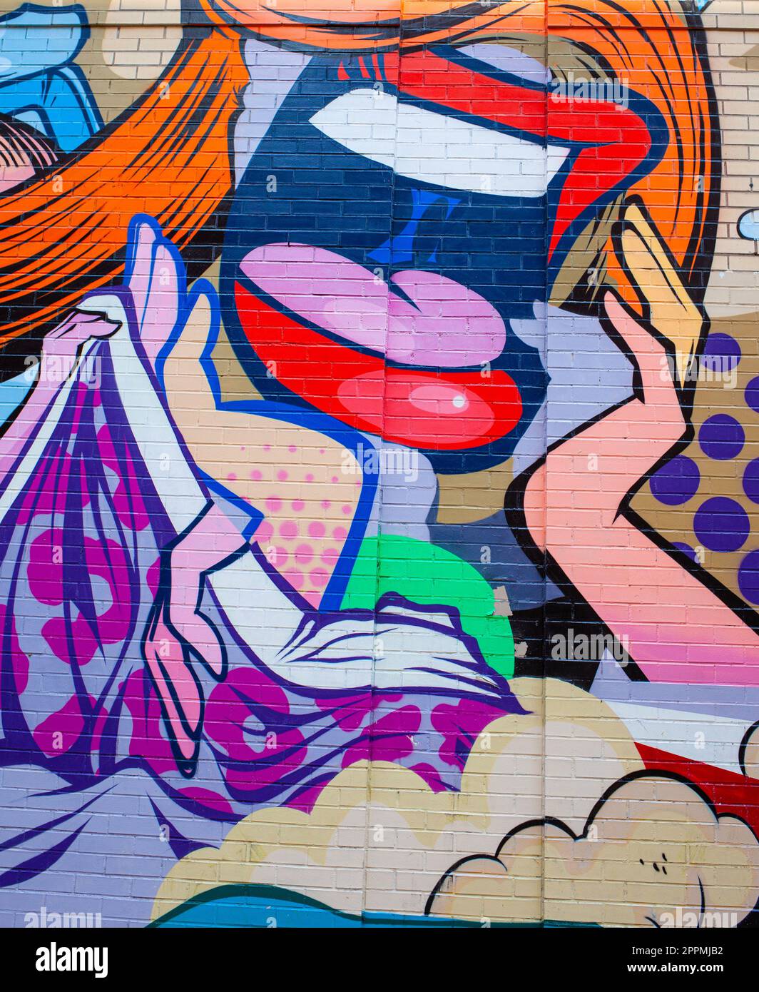 Detail of a mural graffiti depicting a woman's mouth with red lipstick Stock Photo Alamy