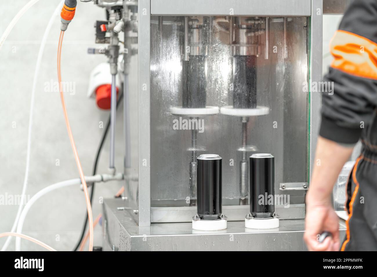 beer filled beverage cans in a brewery Stock Photo Alamy