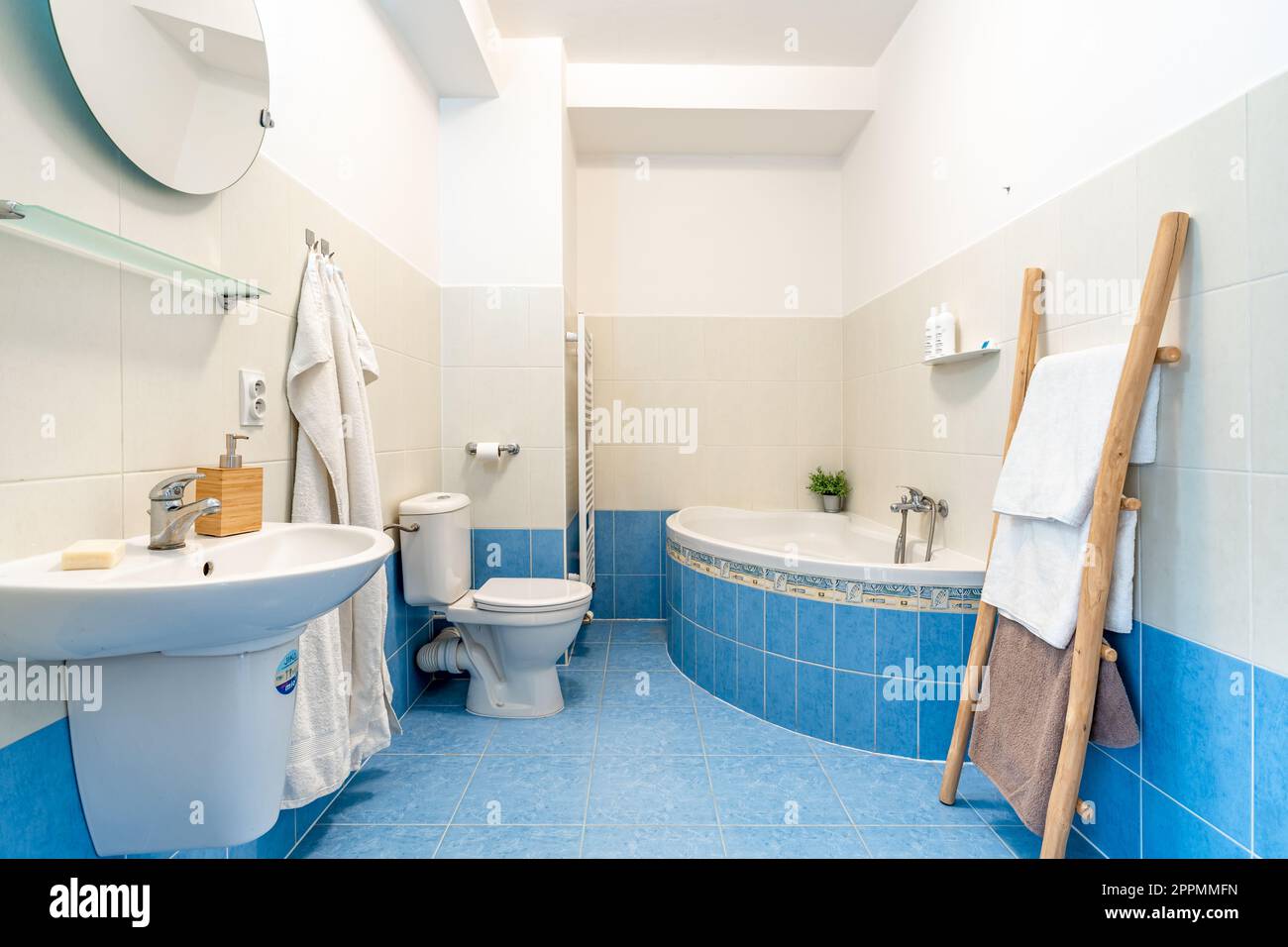blue bathroom in the apartment Stock Photo Alamy