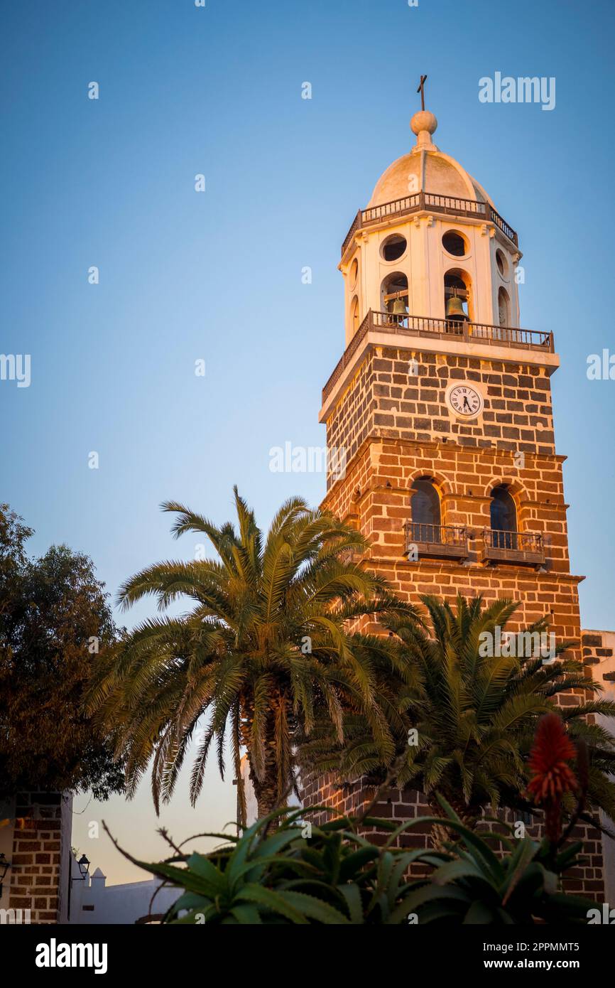 View on the clock tower of the church of Teguise, former capital of the Spanish Canary island of Lanzarote Stock Photo