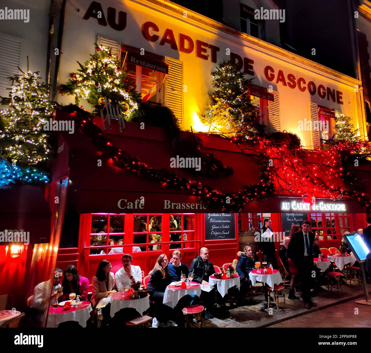 The Place du Tertre with tables of cafe and the Sacre-Coeur in the morning, quarter Montmartre in Paris, France Stock Photo