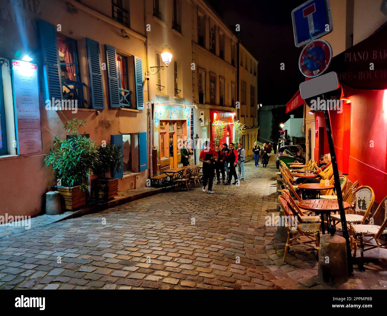The Place du Tertre with tables of cafe and the Sacre-Coeur in the morning, quarter Montmartre in Paris, France Stock Photo