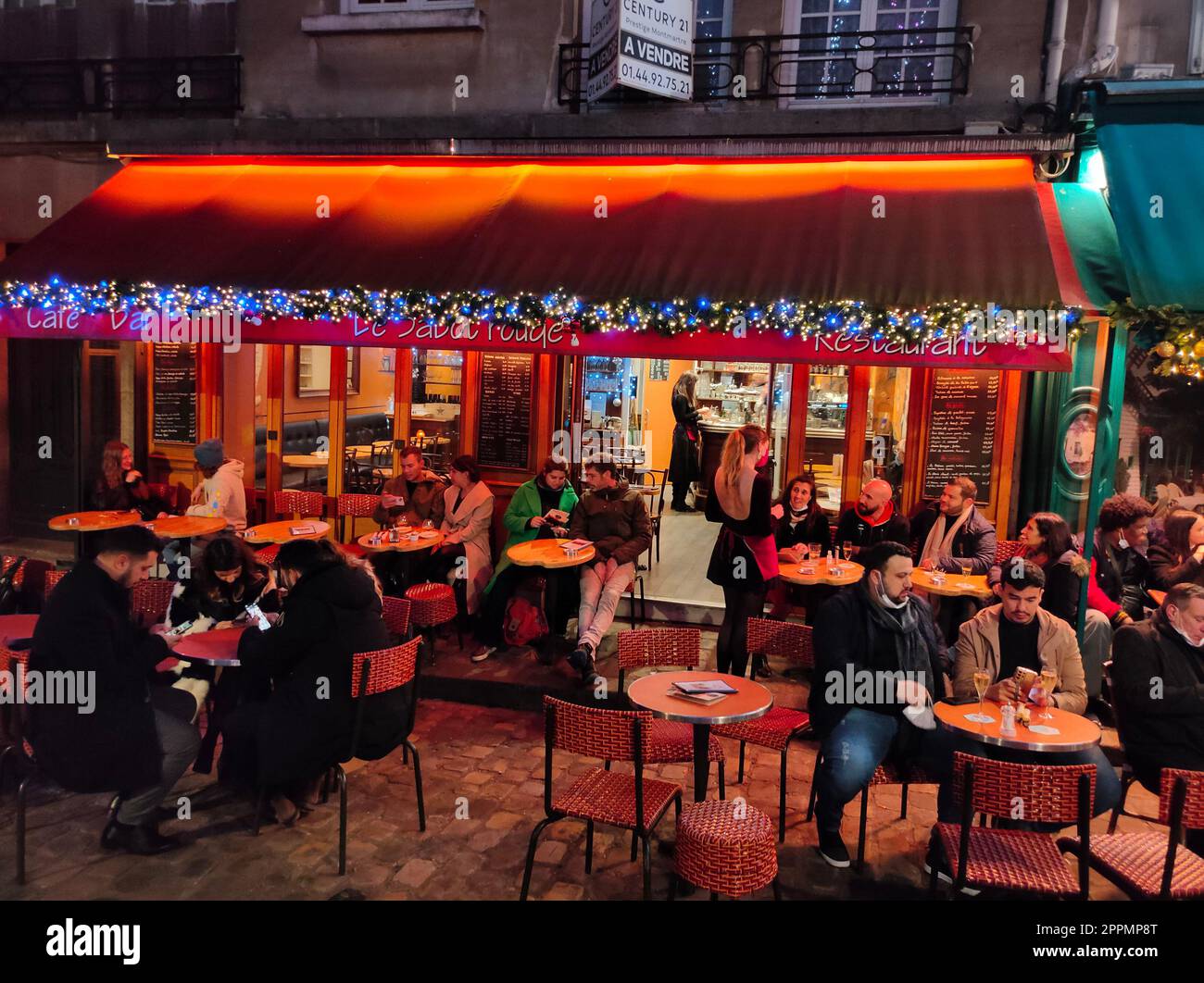 The Place du Tertre with tables of cafe and the Sacre-Coeur in the morning, quarter Montmartre in Paris, France Stock Photo