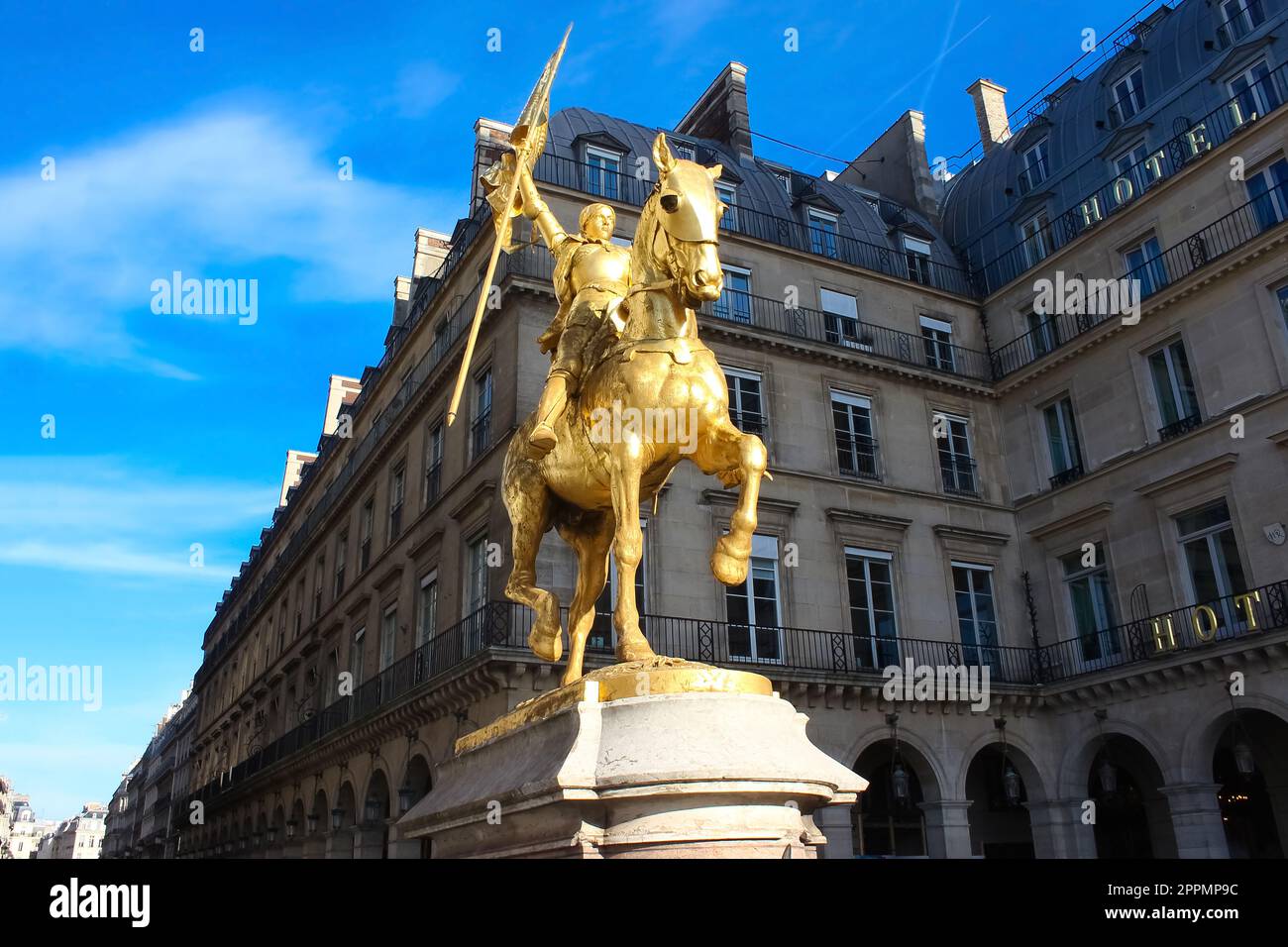 The golden statue of Saint Joan of Arc on the Rue de Rivoli in Paris, France. sculpted by Emmanuel Fremiet in 1864. Stock Photo
