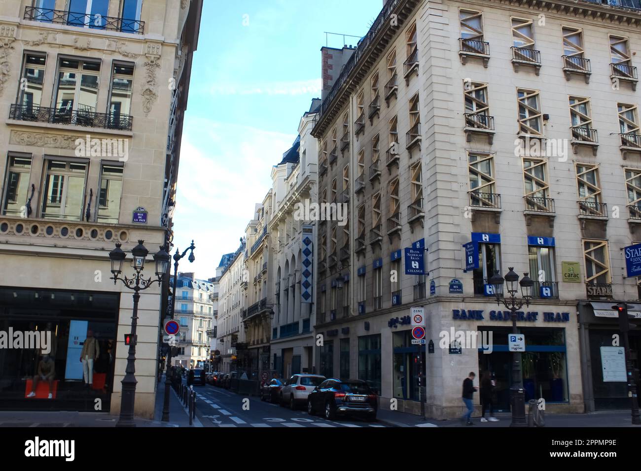 Paris, France - January 01, 2022: People going at rue de la Paix at Paris, France on January 01, 2022 Stock Photo