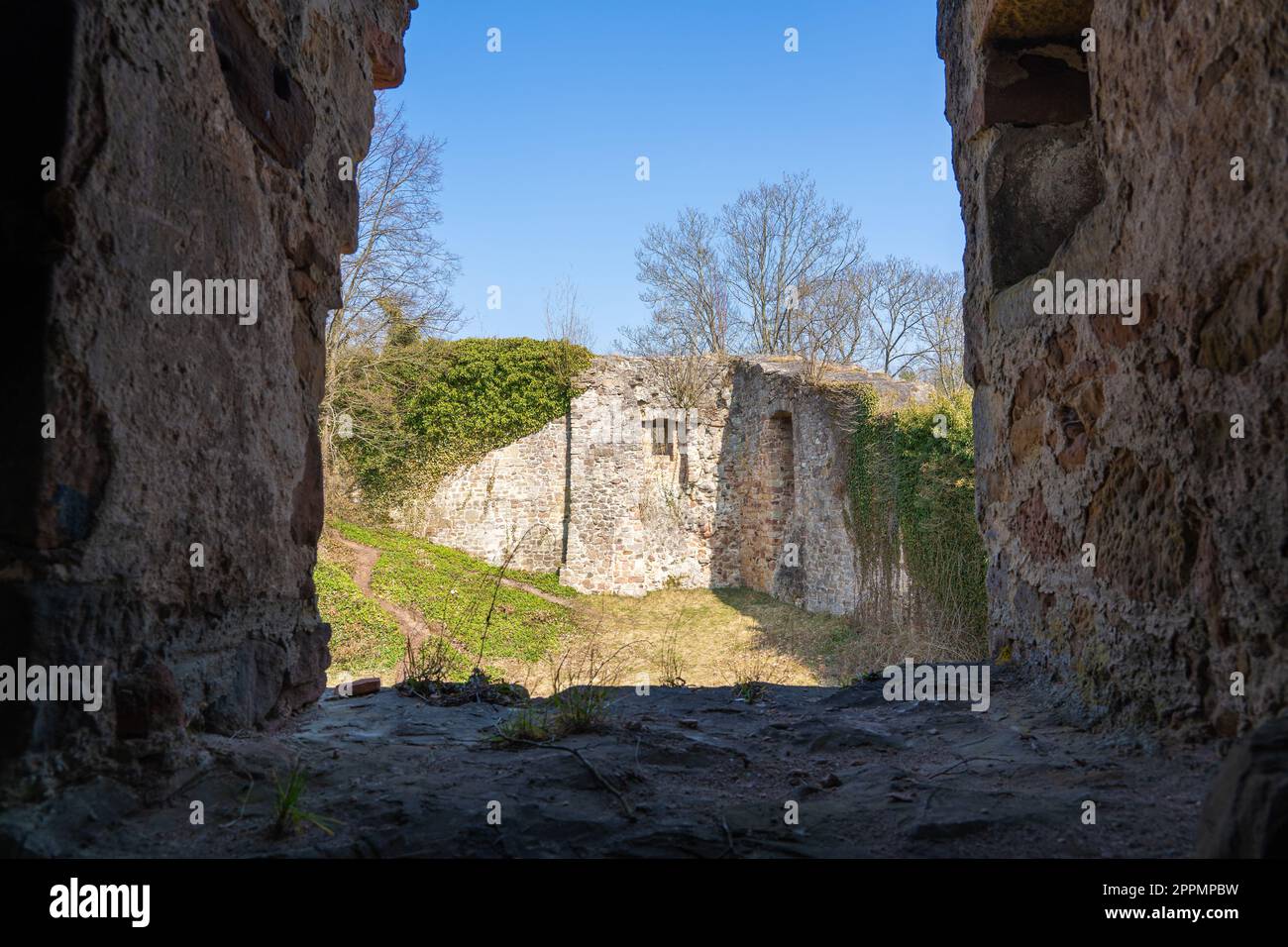 View through the window of a ruined castle Stock Photo