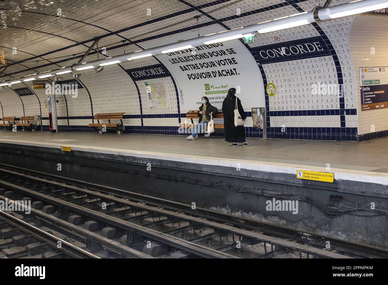 People waiting for metro at Concorde station, famous transport in Paris for rush hour, underground subway. concept city's life and transport. Stock Photo