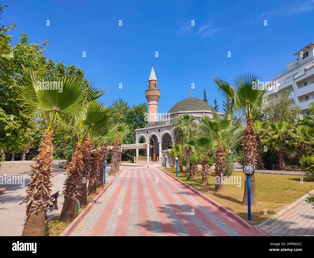 Mosque in Kemer on the backdrop of the mountains, Antalya province Turkey Stock Photo