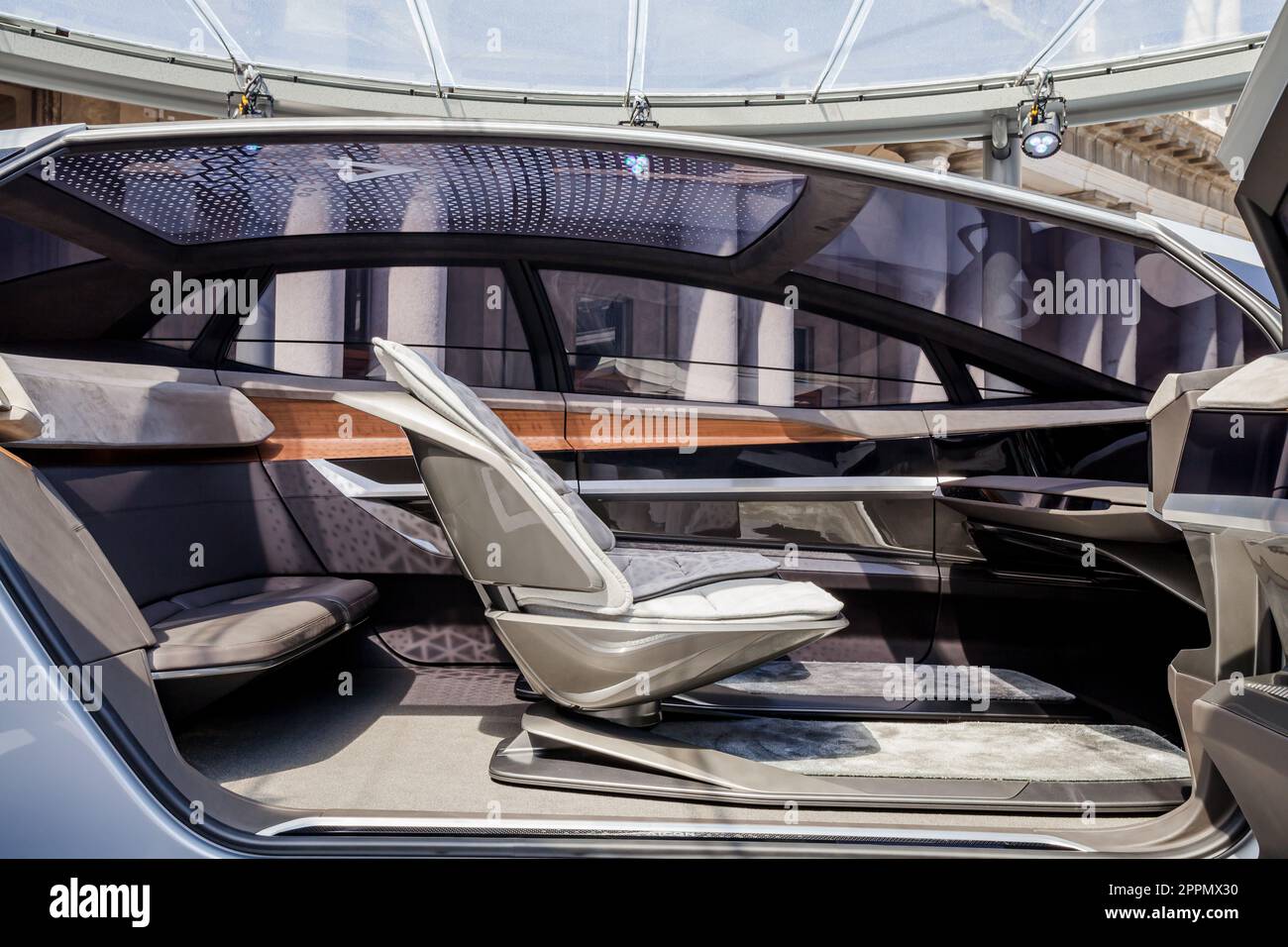 MILAN, ITALY - APRIL 16 2018: Audi city lab. Interior view of white Audi Aicon concept car, self-driving luxury sedan with electric propulsion scheme. Stock Photo