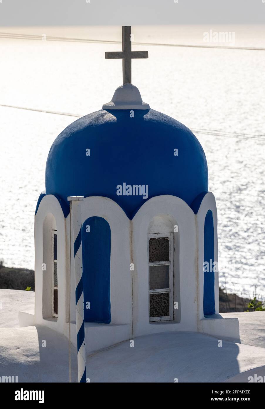 Blue dome of  greek orthodox Christian church in Oia. Santorini, Greece Stock Photo