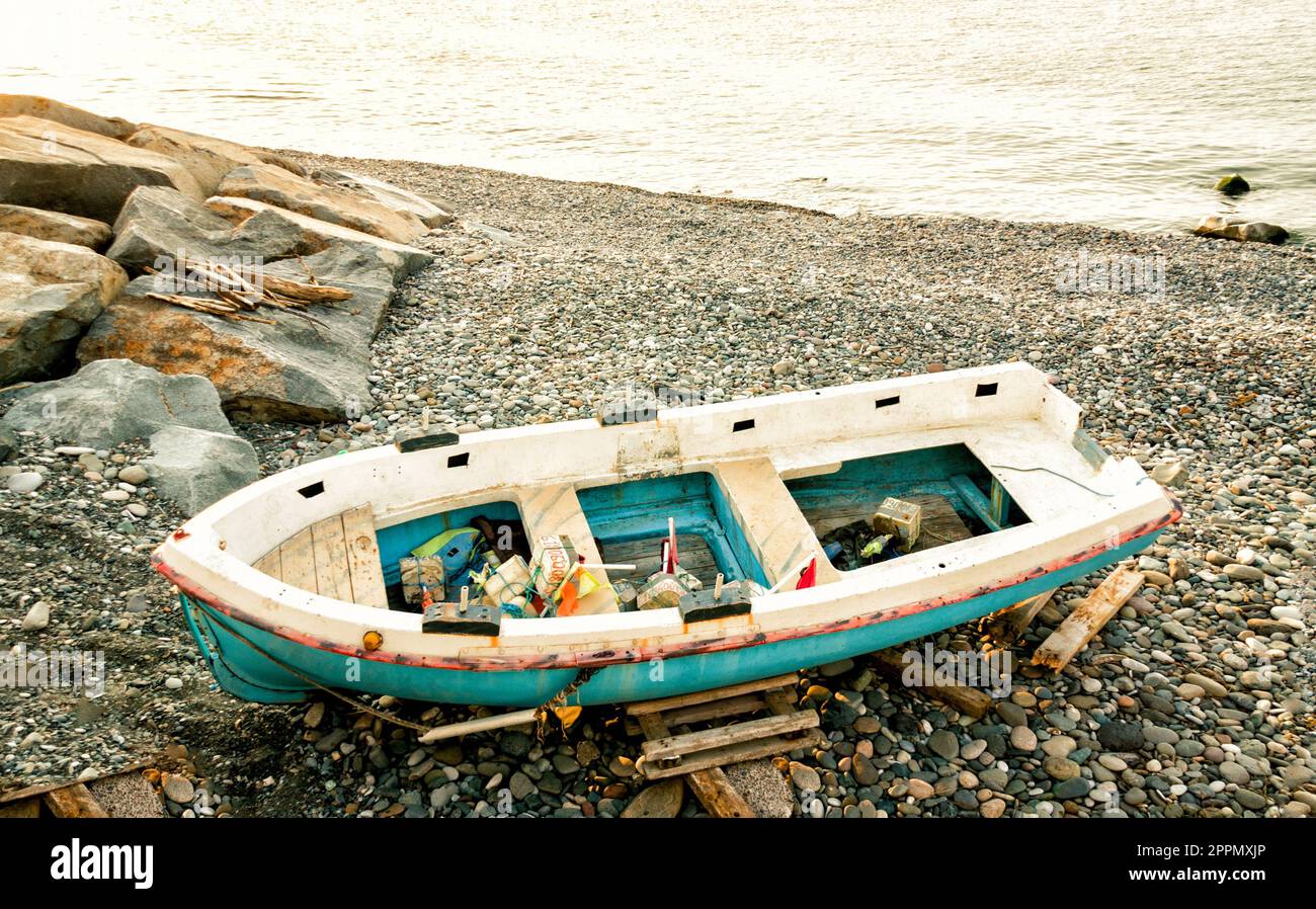 Old fisherman boat on the beach Stock Photo - Alamy