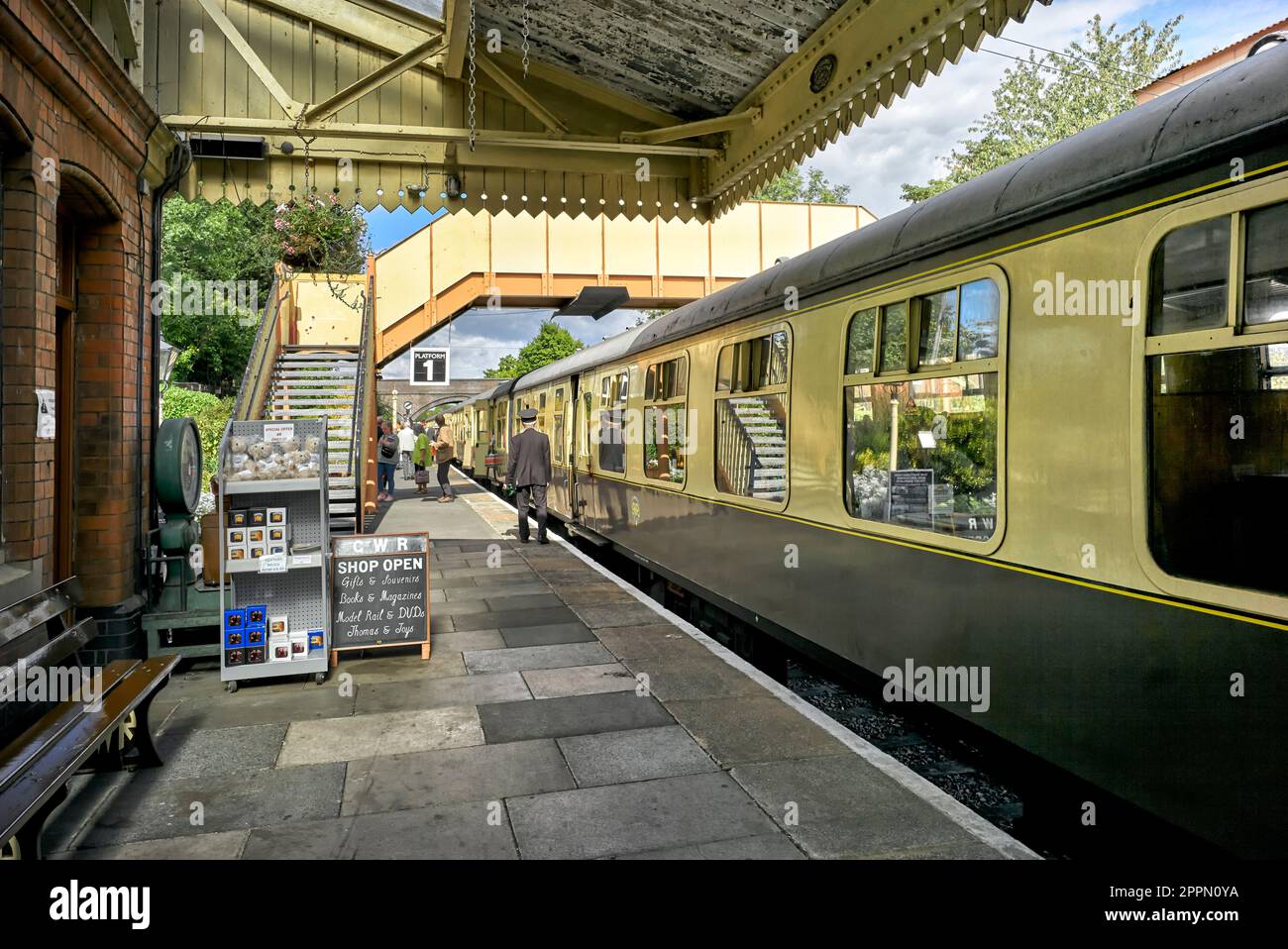 GWR preserved railway station Toddington Gloucestershire England UK with train at the platform Stock Photo