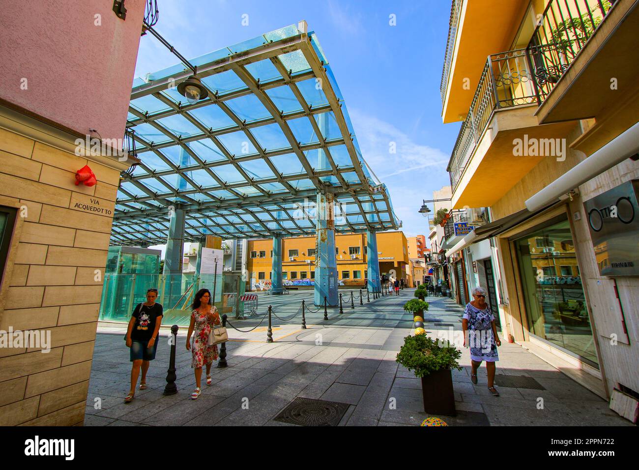 Olbia, Sardinia - August 8, 2019 : Glass cover of 'Piazza Mercato', the Market Square of the historical city center of Olbia, an old town located by t Stock Photo