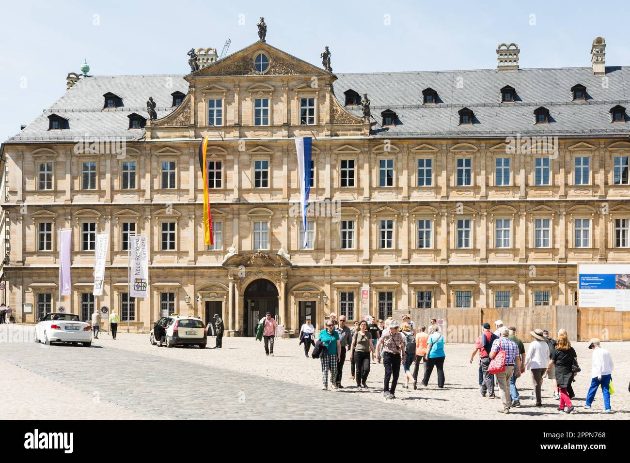 BAMBERG, GERMANY - MAI 6: Tourists at Neue Residenz in Bamberg, Germany on Mai 6, 2016. The Neue Residenz was the former residence of the bishops of Stock Photo