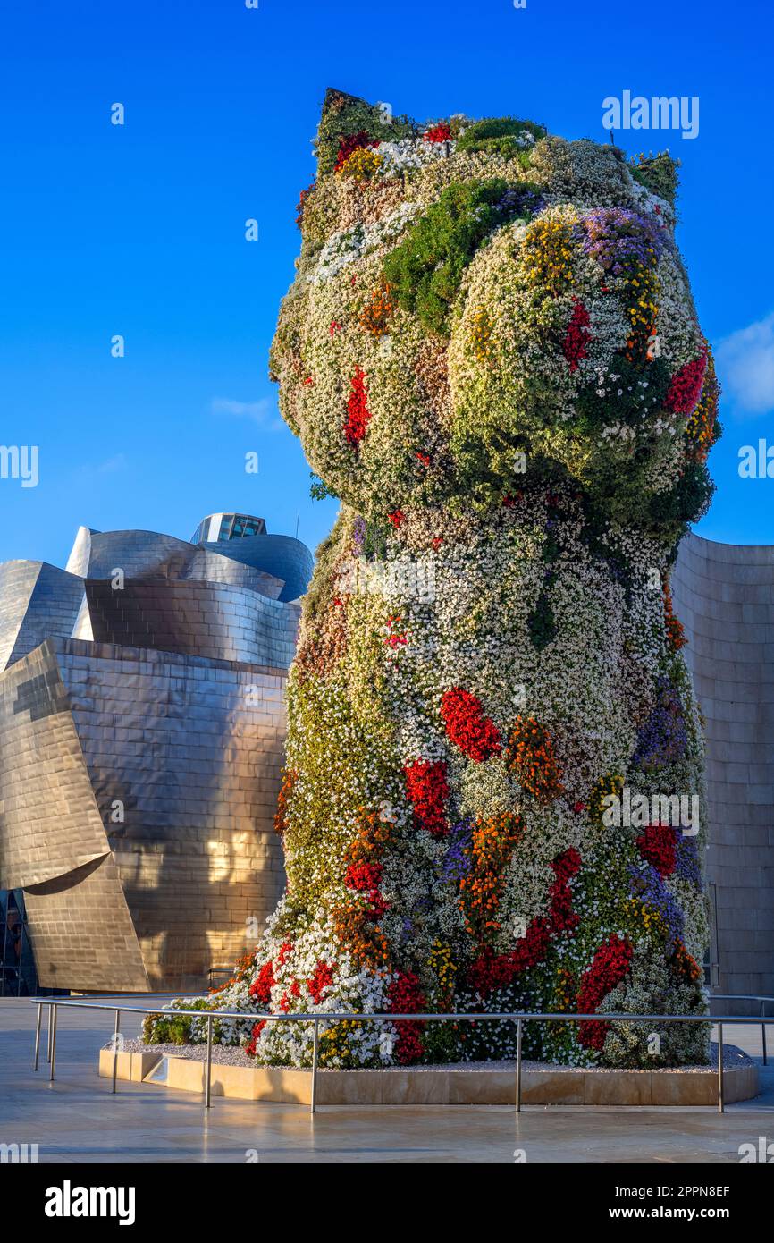 Dog Puppy, a floral topiary sculpture by Jeff Koons, stands guard in