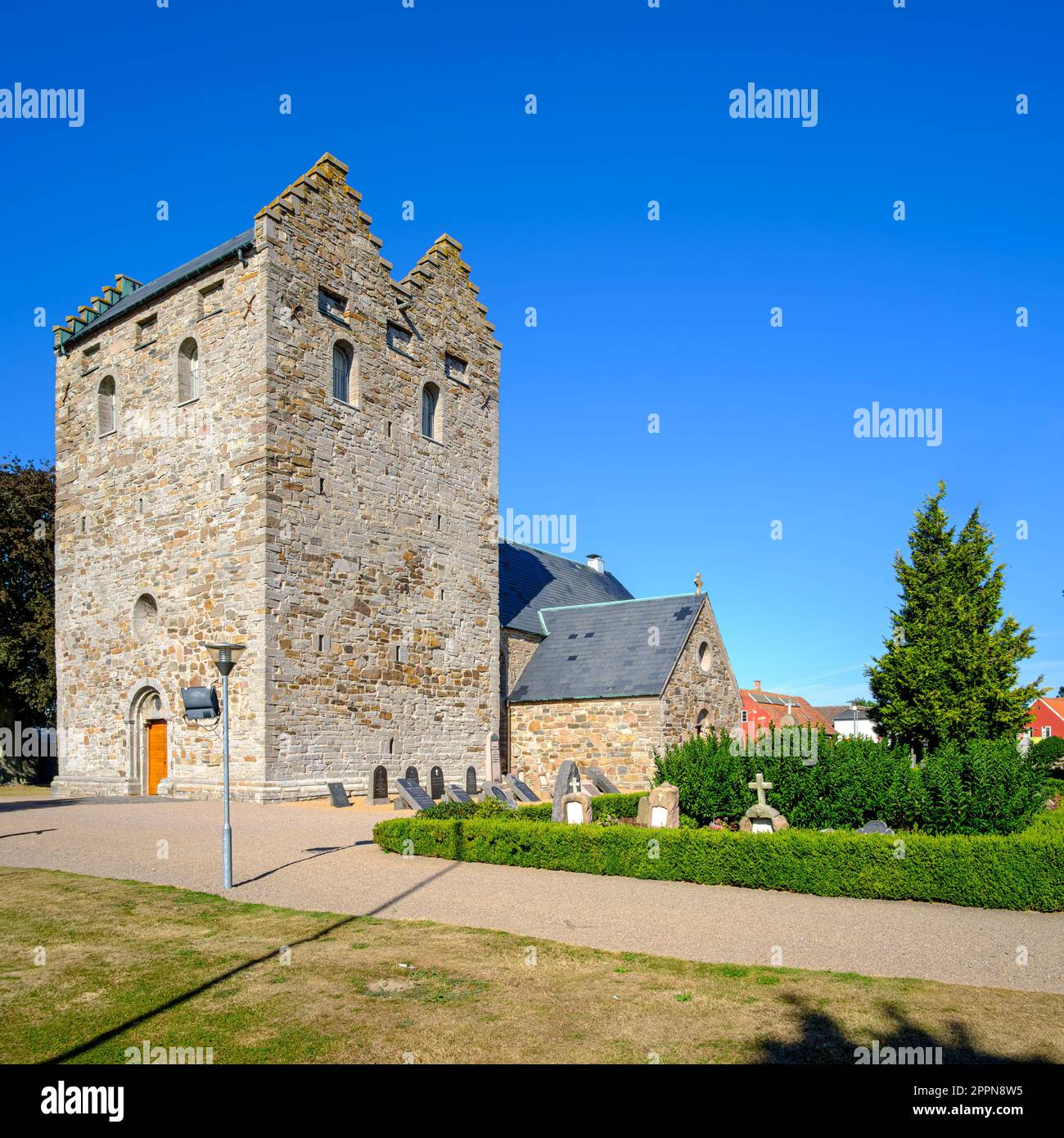 Aa Kirke and churchyard, the church of Aakirkeby, Bornholm Island, Denmark, Scandinavia, Europe. Stock Photo
