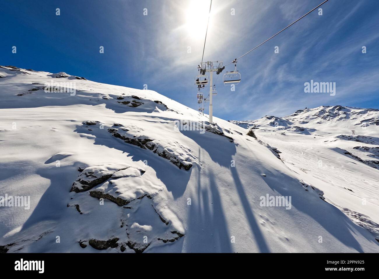 Chairlift post at the top of a snowy mountain above the Val Thorens ski
