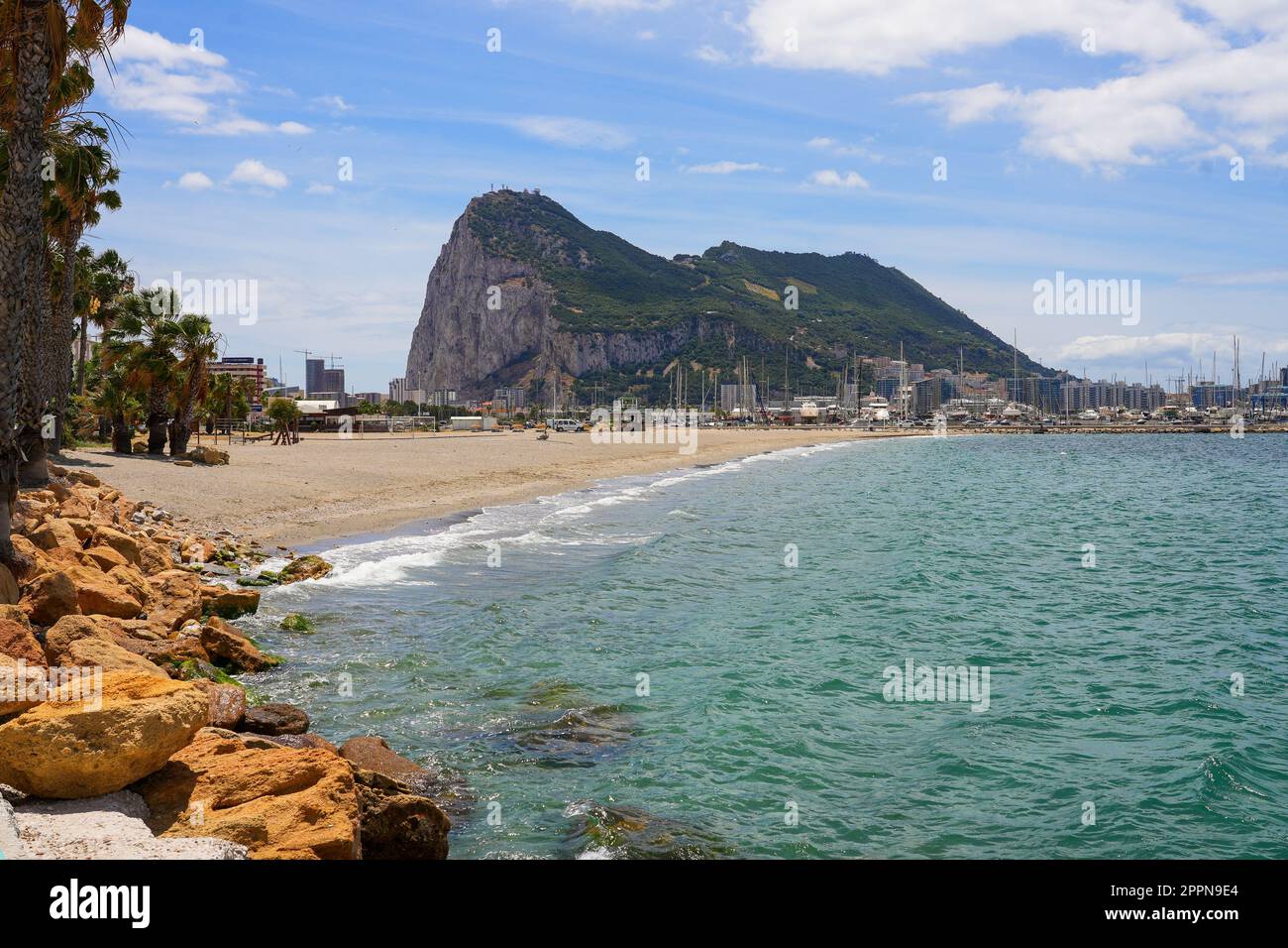 Poniente Beach in La Linea with a view over the Rock of Gibraltar in Andalusia, Spain Stock Photo