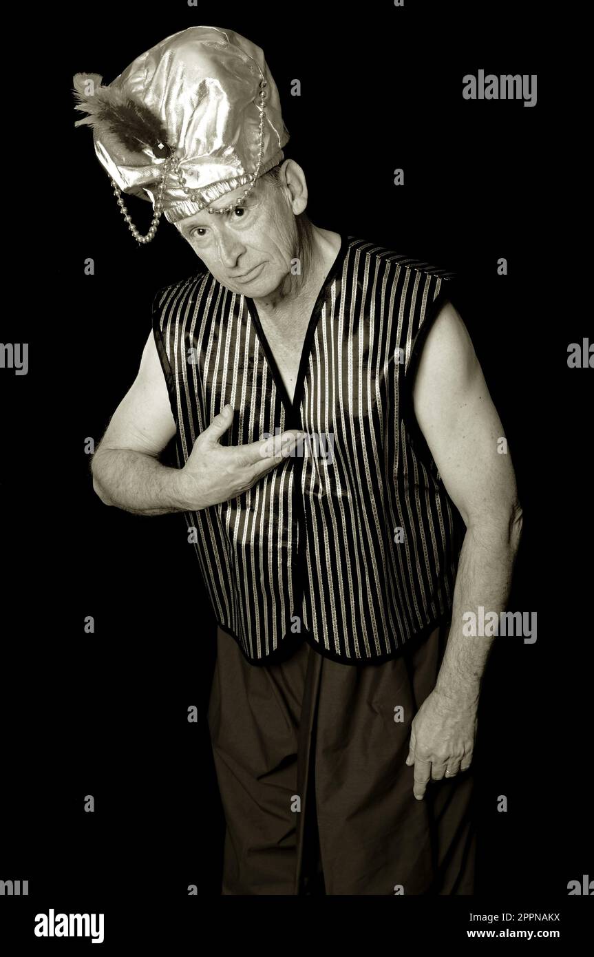 An elder sultan or shiek isolated over black Stock Photo - Alamy