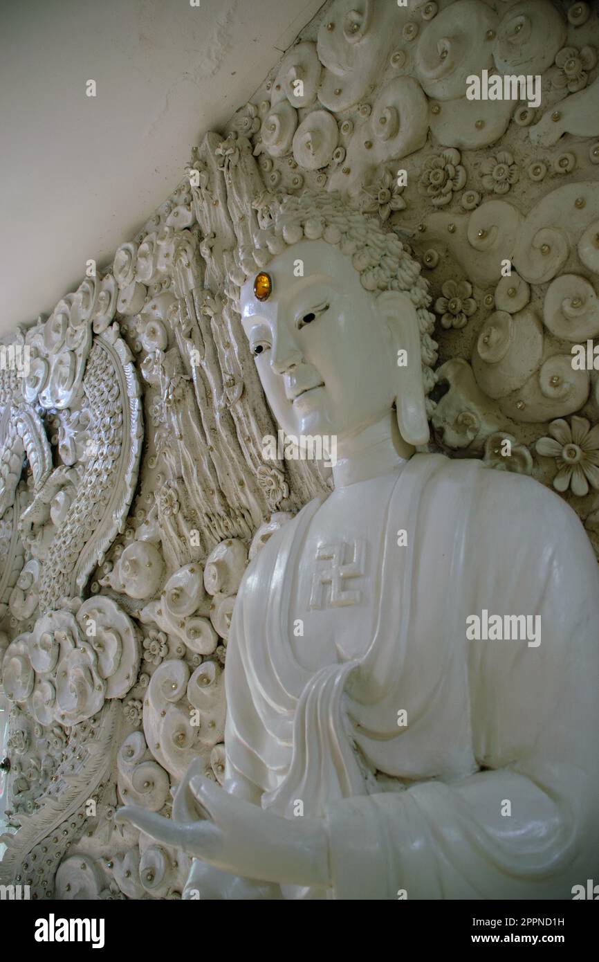Ancient white Buddha statue in Chinese temple wat Hyua Pla Kang Stock