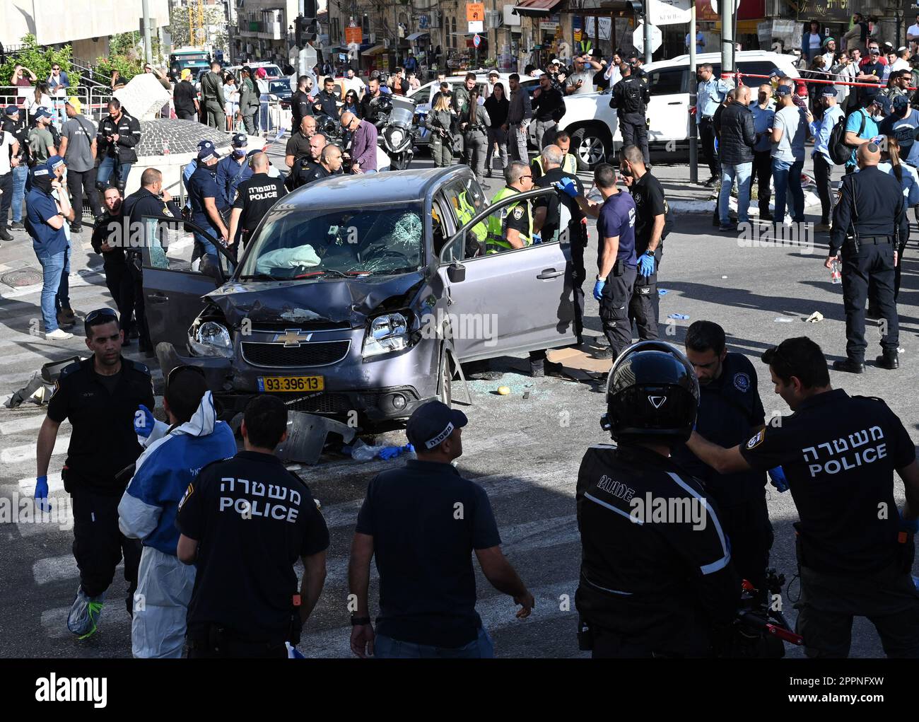 Jerusalem, Israel. 24th Apr, 2023. Israeli police surround a car used in a  ramming terror attack near the Mahane Yehuda Market in Jerusalem on Monday,  April 24, 2023. The Palestinian driver from