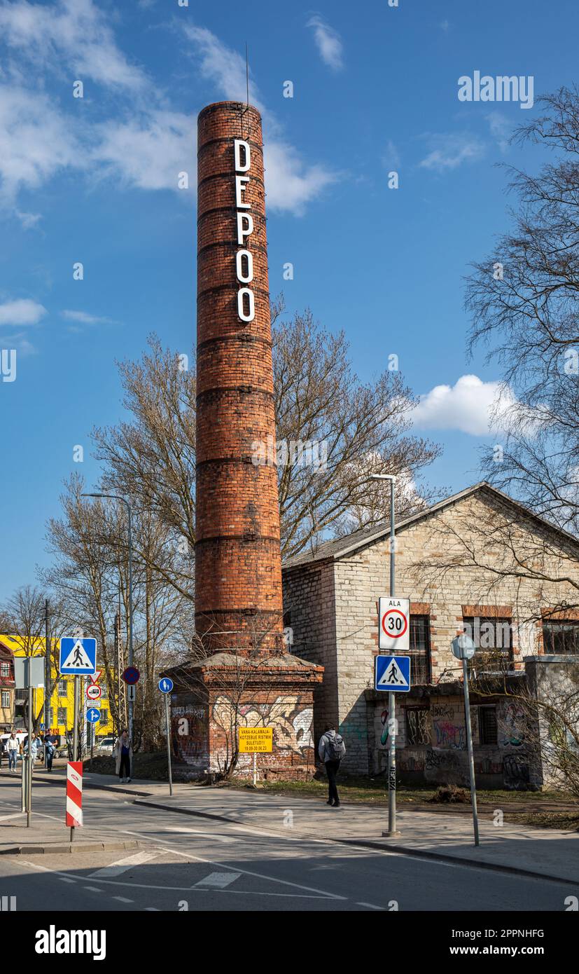 Depoo. Light up letters on old industrial chimney in Telliskivi district of Tallinn, Estonia. Stock Photo