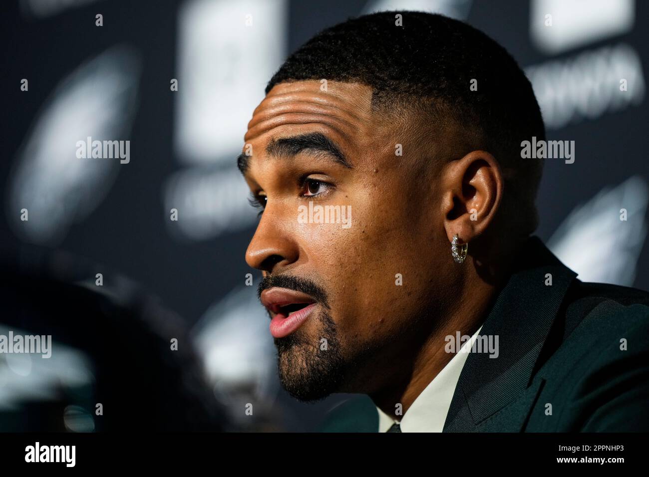 Philadelphia Eagles quarterback Jalen Hurts speaks with members of the